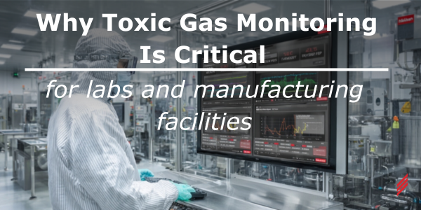 Engineer wearing full cleanroom PPE reviewing real-time toxic gas monitoring data on large display screens inside a semiconductor cleanroom, showing live gas concentration graphs and system performance trends.